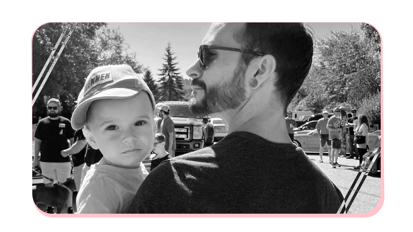 Dad Driven founder holding his little driver at a car event | Where speed meets fatherhood